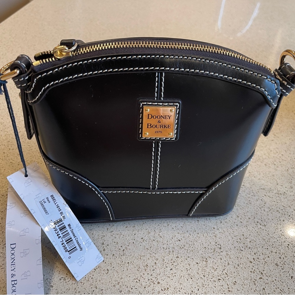 Brand new with tags Black  Dooney and Bourke Beacon Domed crossbody
